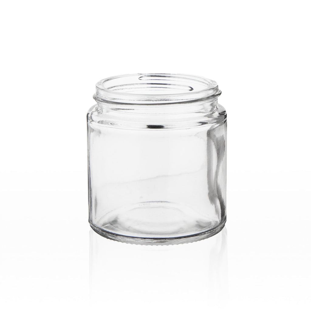Clear glass jar with straight profile and white screw cap for professional packaging